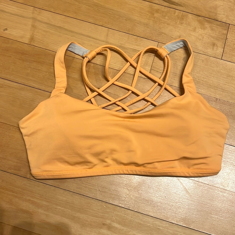 Lululemon strappy orange sports bra, size 8